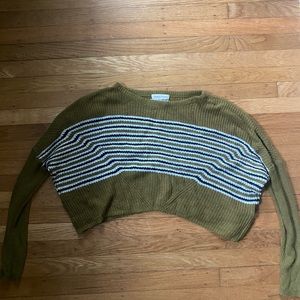 Cropped green sweater.